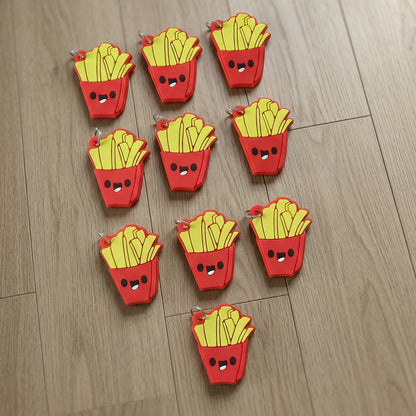 Set of 10 cute French fries-shaped bag charm keychains from Wukusy, colorful and playful accessories for bags or keys.
