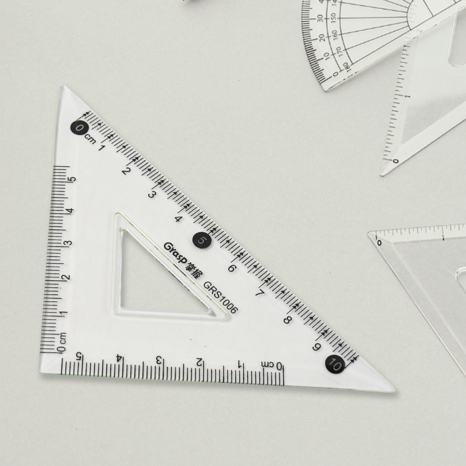 Wukusy 4-piece office geometry set with triangle ruler, protractor, and straight rulers for precise angle and measurement tasks.