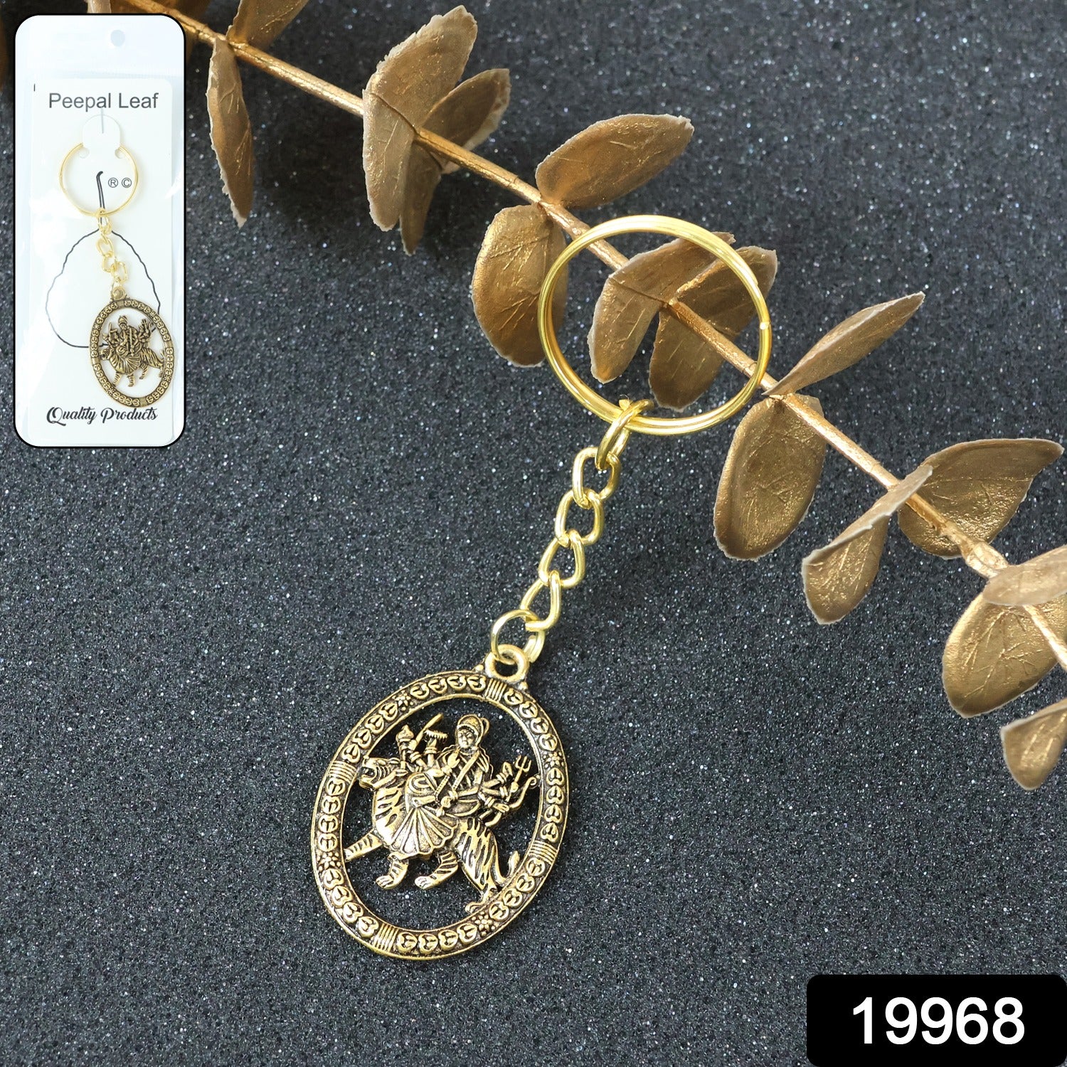 Golden Maa Durga oval frame keychain by Wukusy featuring a detailed religious image on a keyring.