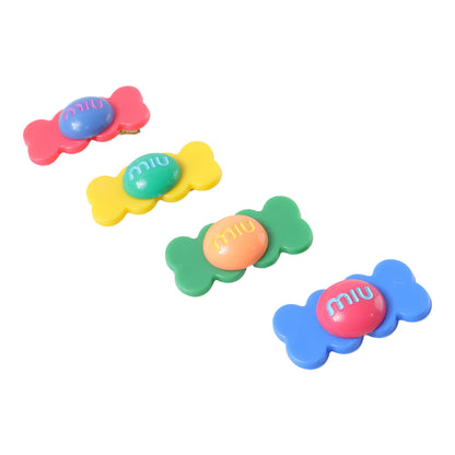 Colorful candy-shaped hair clips by Wukusy featuring bright, playful designs perfect for adding a fun touch to hairstyles.