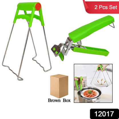Set of two Wukusy stainless steel kitchen hot plate gripper clips holding bowls securely.