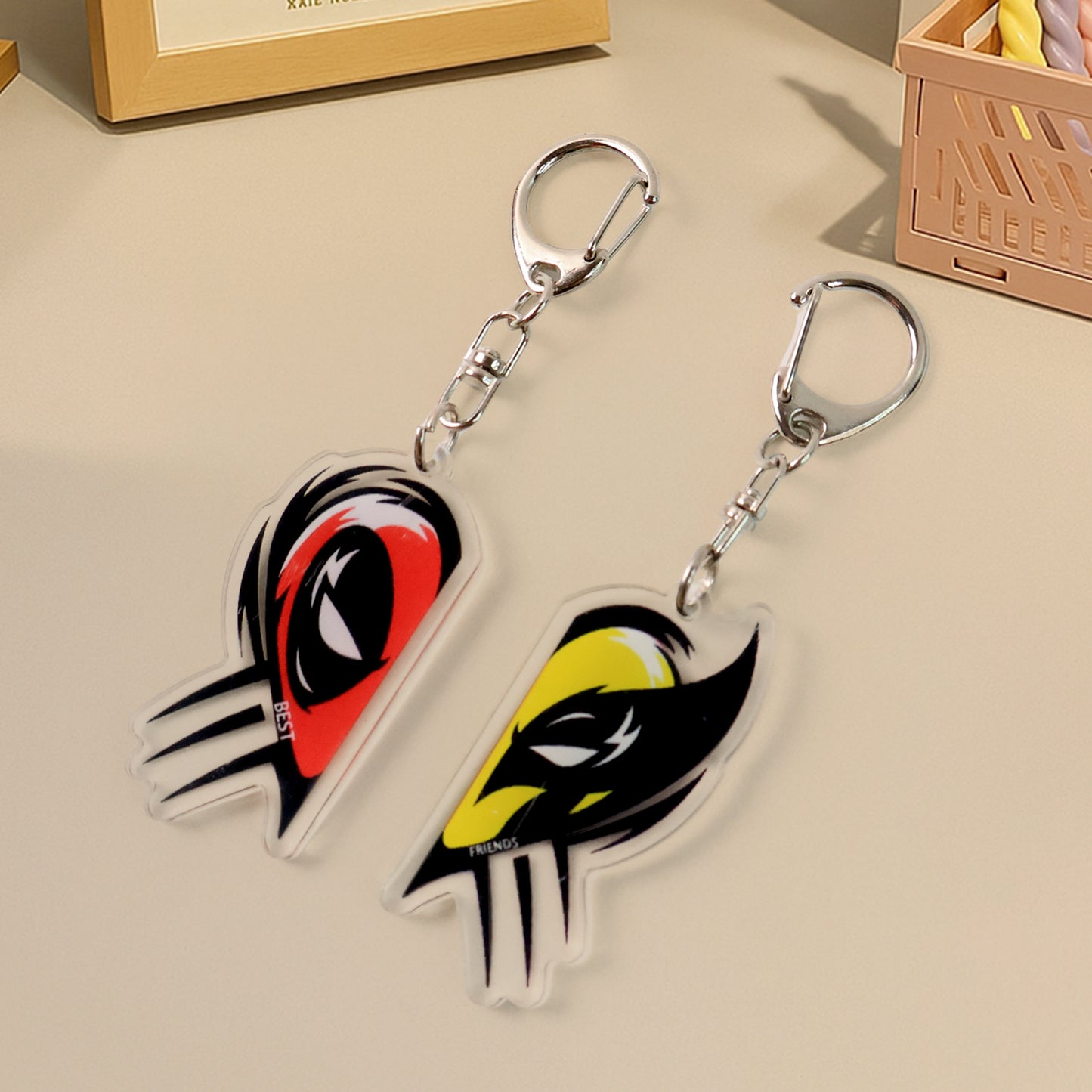 Two matching acrylic keychains with "Best Friends" design from Wukusy, featuring breakable heart-shaped decor for home or gifts.