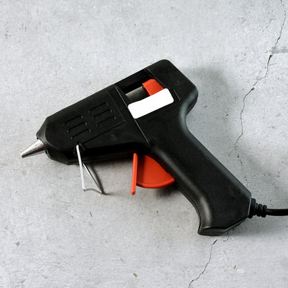 Wukusy 20W hot melt glue gun for craft and repair, fast-heating adhesive applicator with ergonomic design.