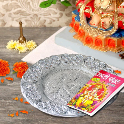Silver-plated Swastik Pooja Thali set by Wukusy, glossy home decor puja thali with intricate designs for religious rituals.