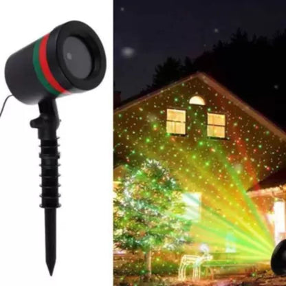 Wukusy 7350 Star Fairy Motion Laser Lights projector displaying multicolored star patterns on garden lawn for festive outdoor decor