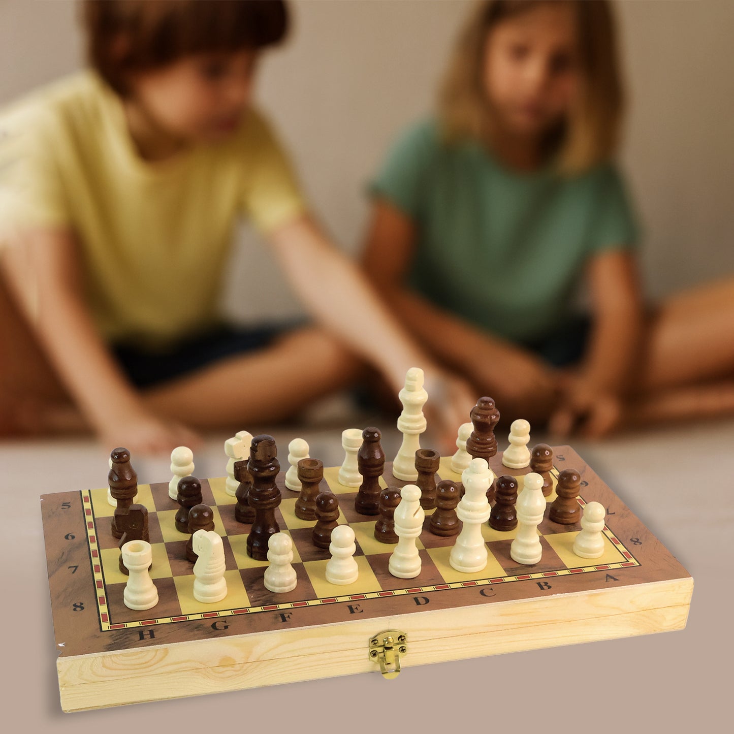 Foldable wooden chess board set by Wukusy showing 30x30 cm chessboard with chess pieces in a natural wooden finish.