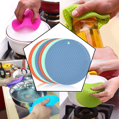 Wukusy silicone hot mat for breakfast, lunch, and dinner, used to protect surfaces from hot dishes and cookware.