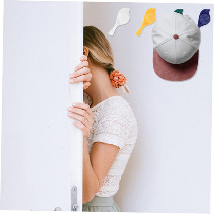 Set of four Wukusy bird-shaped adhesive wall hooks for towels, hats, coats, and doors, featuring decorative and functional design.
