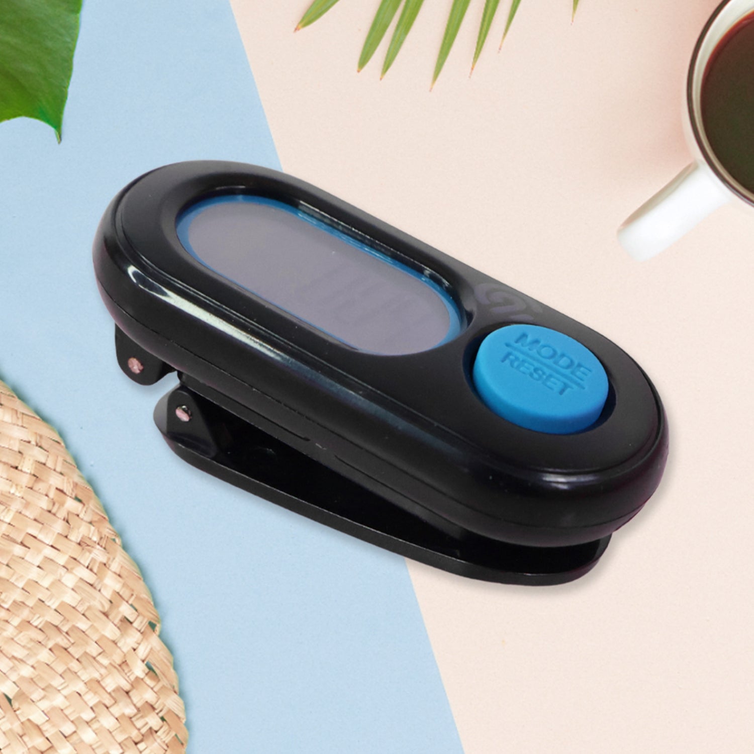 Wukusy digital step distance pedometer with LCD display showing step count and distance measurement on a compact device