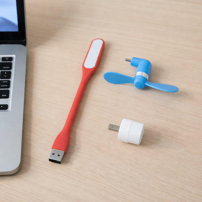 Wukusy 3-in-1 laptop accessory combo set including a portable stand, cooling pad, and keyboard cover on a clean workspace.