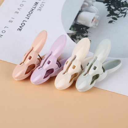 Wukusy clothes drying rope with multiple cloth clips for indoor and outdoor laundry hanging, durable and easy to install.