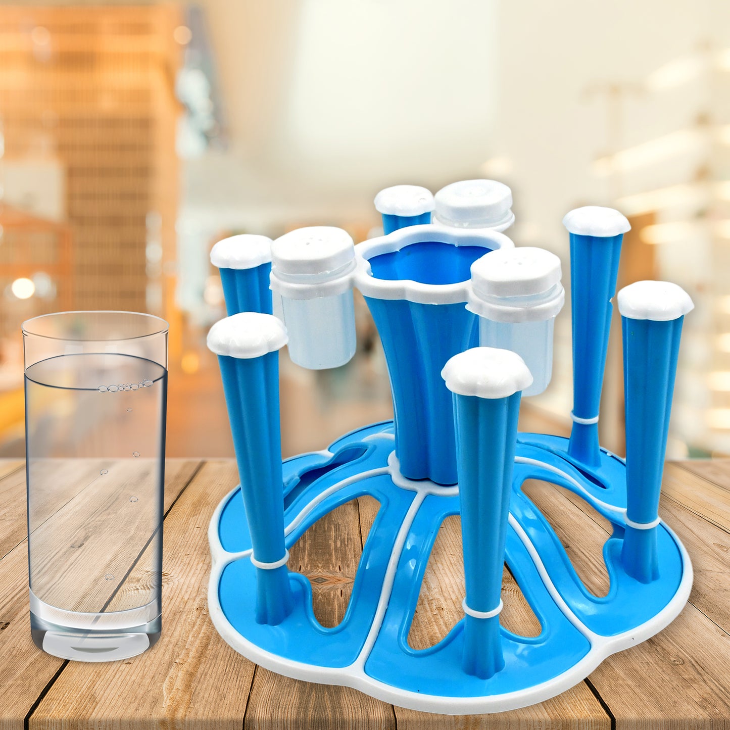 Wukusy Miracle Plastic Glass Stand holding six tumblers with three spice shakers on a kitchen dining table.