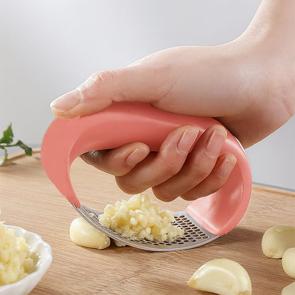 Wukusy Supermom Premium Curve Garlic Press Crusher for kitchen use, stainless steel design with ergonomic handle.