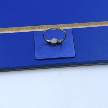 Wukusy phone screen magnifier and video display holder showing a clear enlarged mobile screen with adjustable bracket on a table.