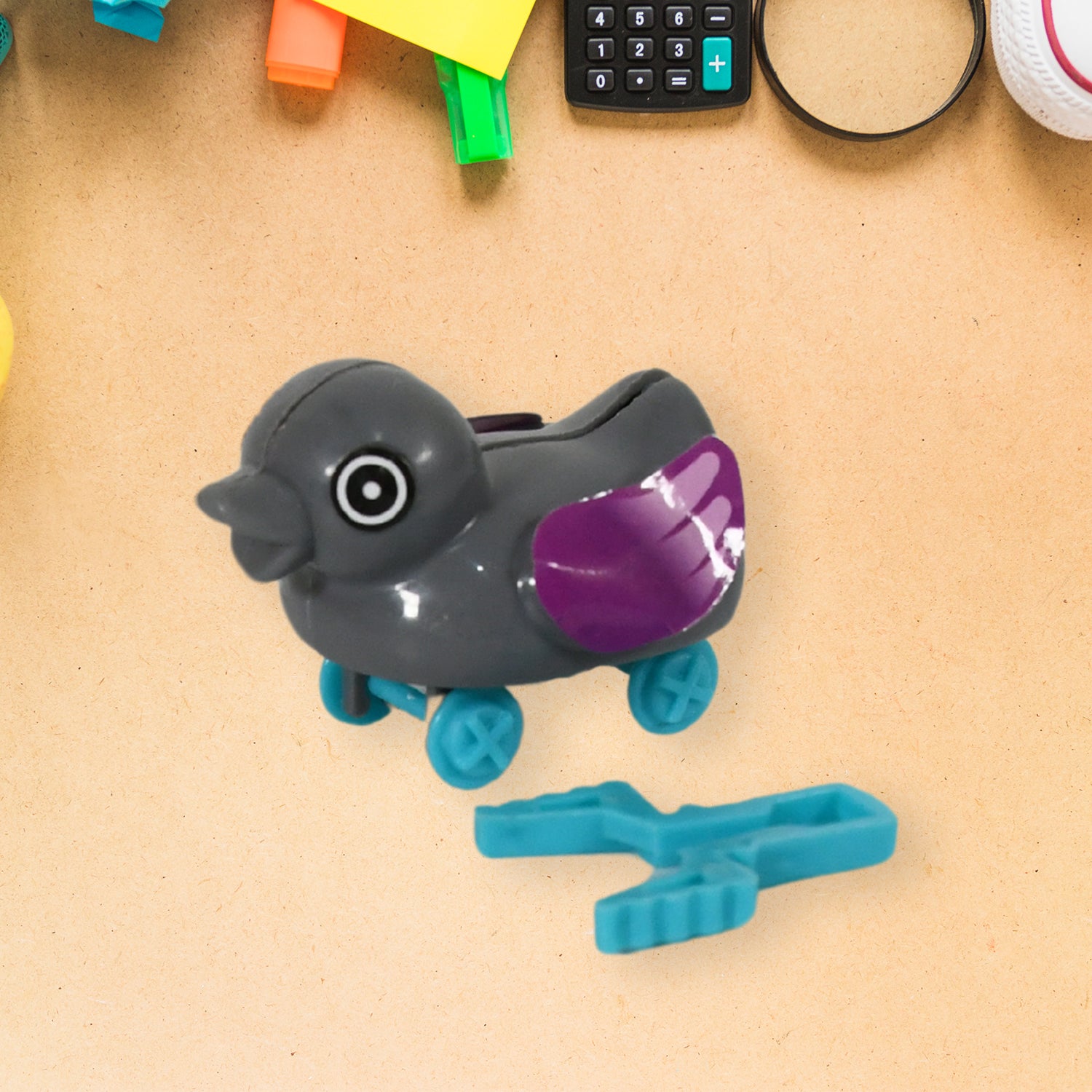 Small Wukusy push-back duck toy with spring tail, ejectable feature, perfect for DIY toy enthusiasts