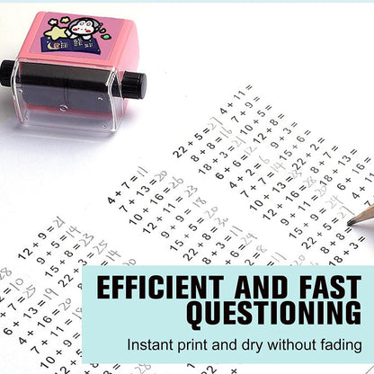Wukusy 4045 Roller Digital Teaching Stamp showing addition and subtraction symbols on a classroom desk
