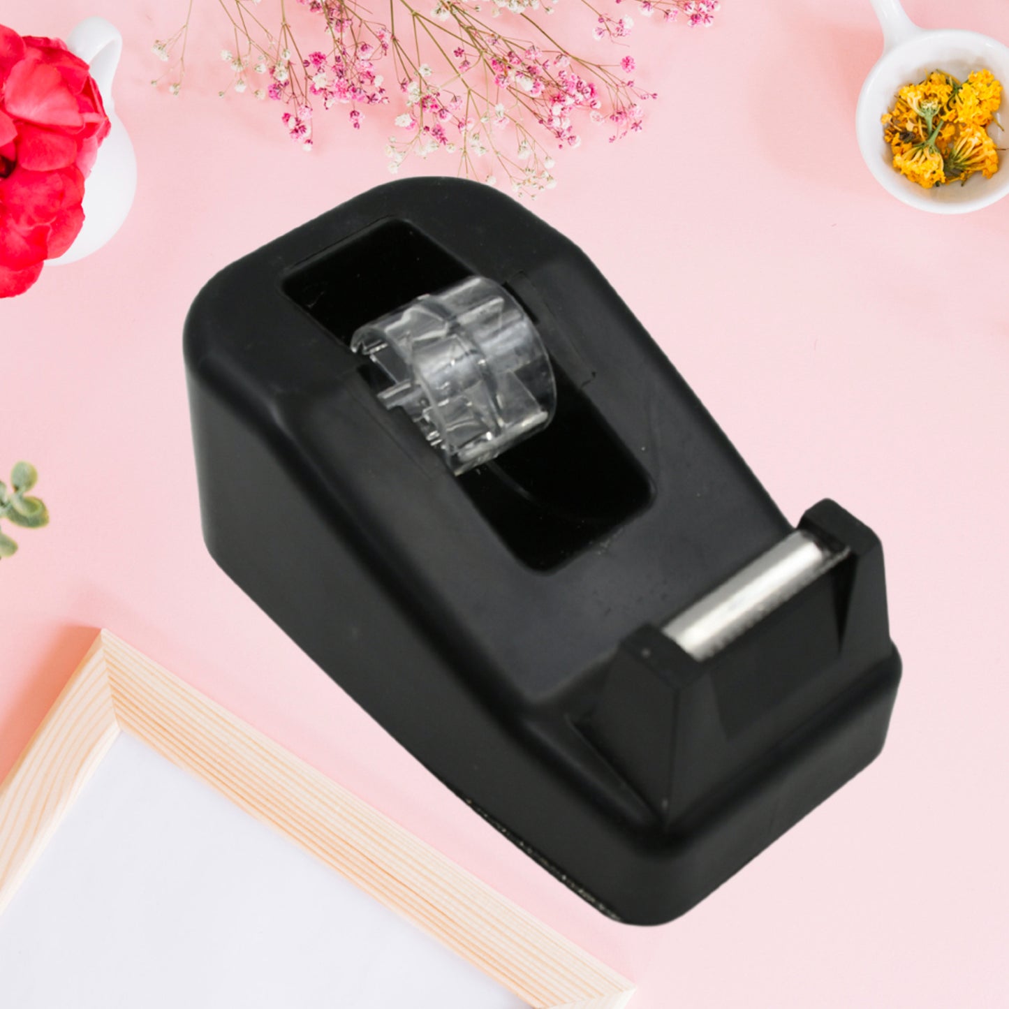 Wukusy plastic tape dispenser cutter for home office use, with a compact design and built-in blade for packaging and stationary tape.