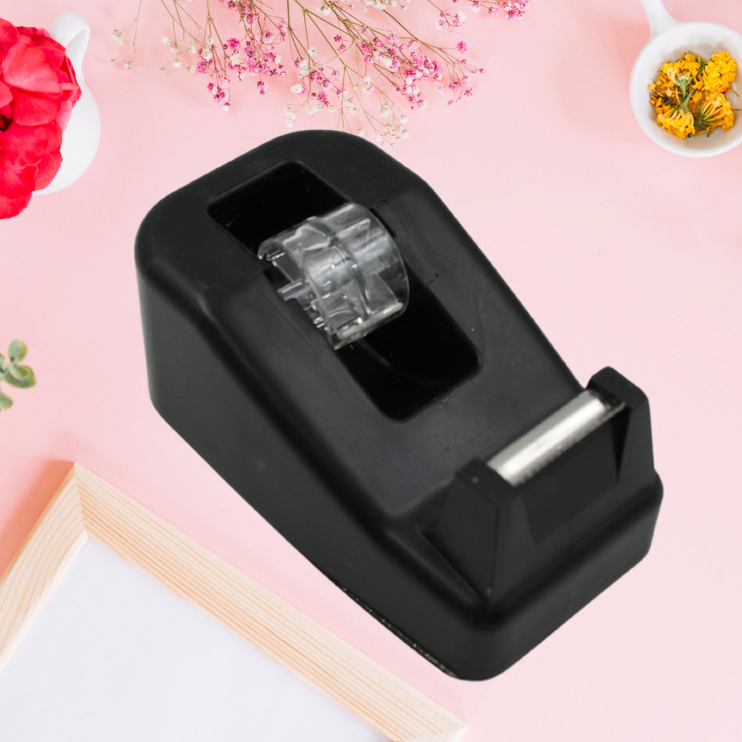 Wukusy plastic tape dispenser cutter for home office use, with a compact design and built-in blade for packaging and stationary tape.