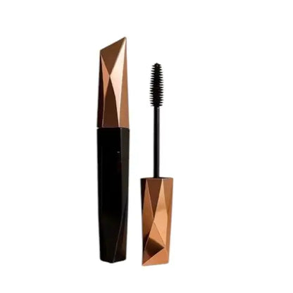 Ekom Volumizing Smudge-Proof Mascara in black, 12ml, with a brush applicator for bold, long-lasting lashes