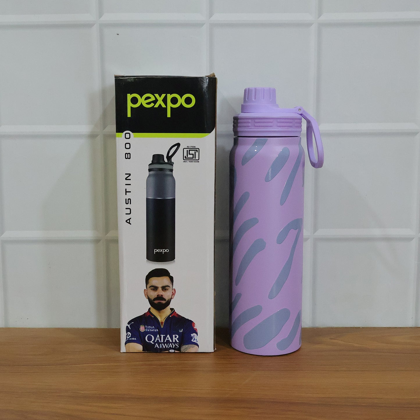 Wukusy Pexpo Austin Art stainless steel water bottle, 800 ml capacity, with colorful abstract design on shiny silver surface
