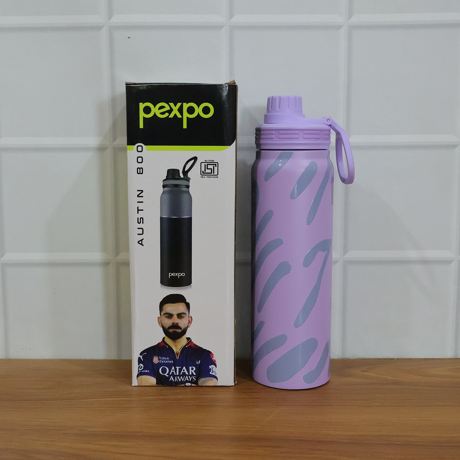 Wukusy Pexpo Austin Art stainless steel water bottle, 800 ml capacity, with colorful abstract design on shiny silver surface