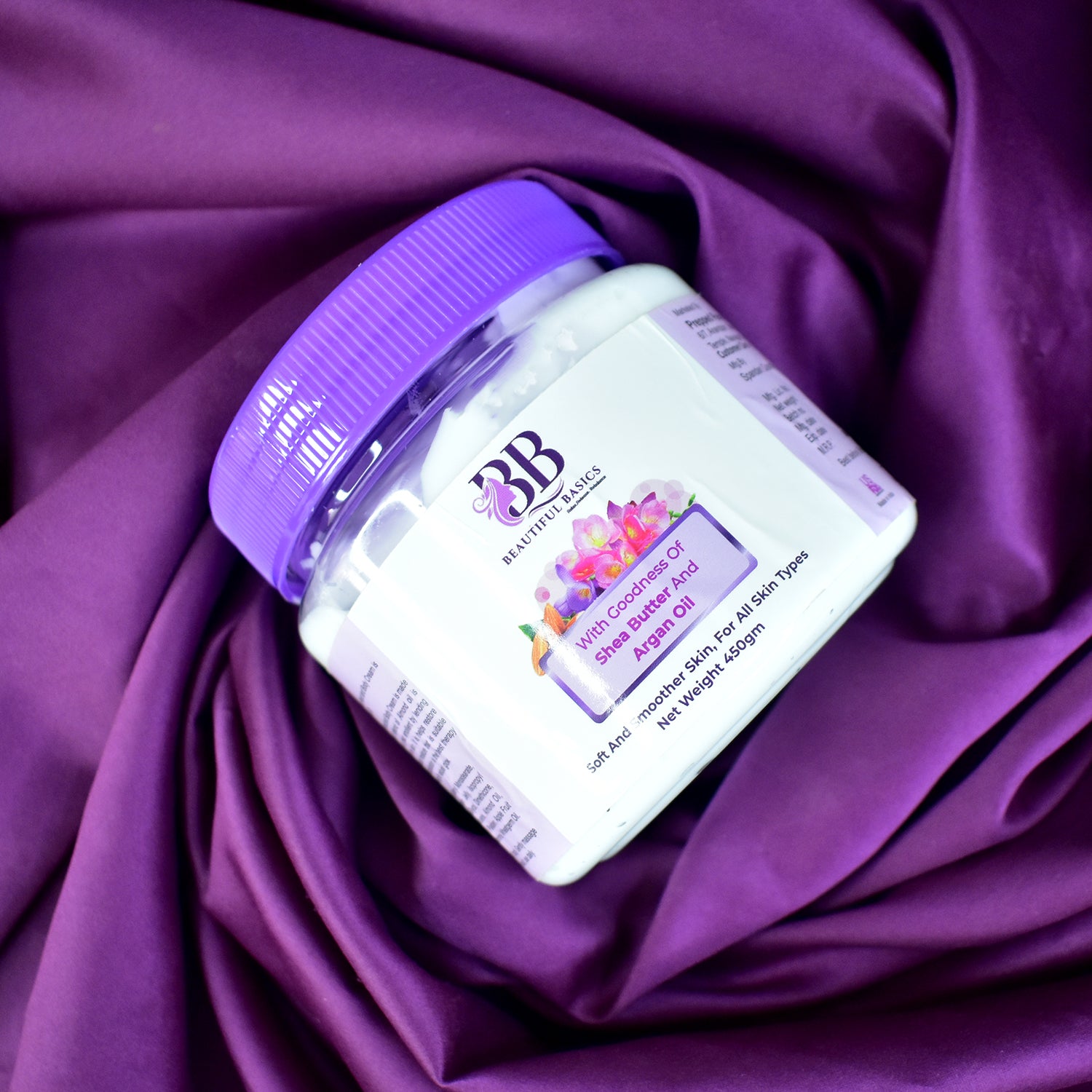 Wukusy Beautiful Basics Shea Butter and Argan Oil Body Cream in 450g jar, showcasing smooth creamy texture and natural ingredients