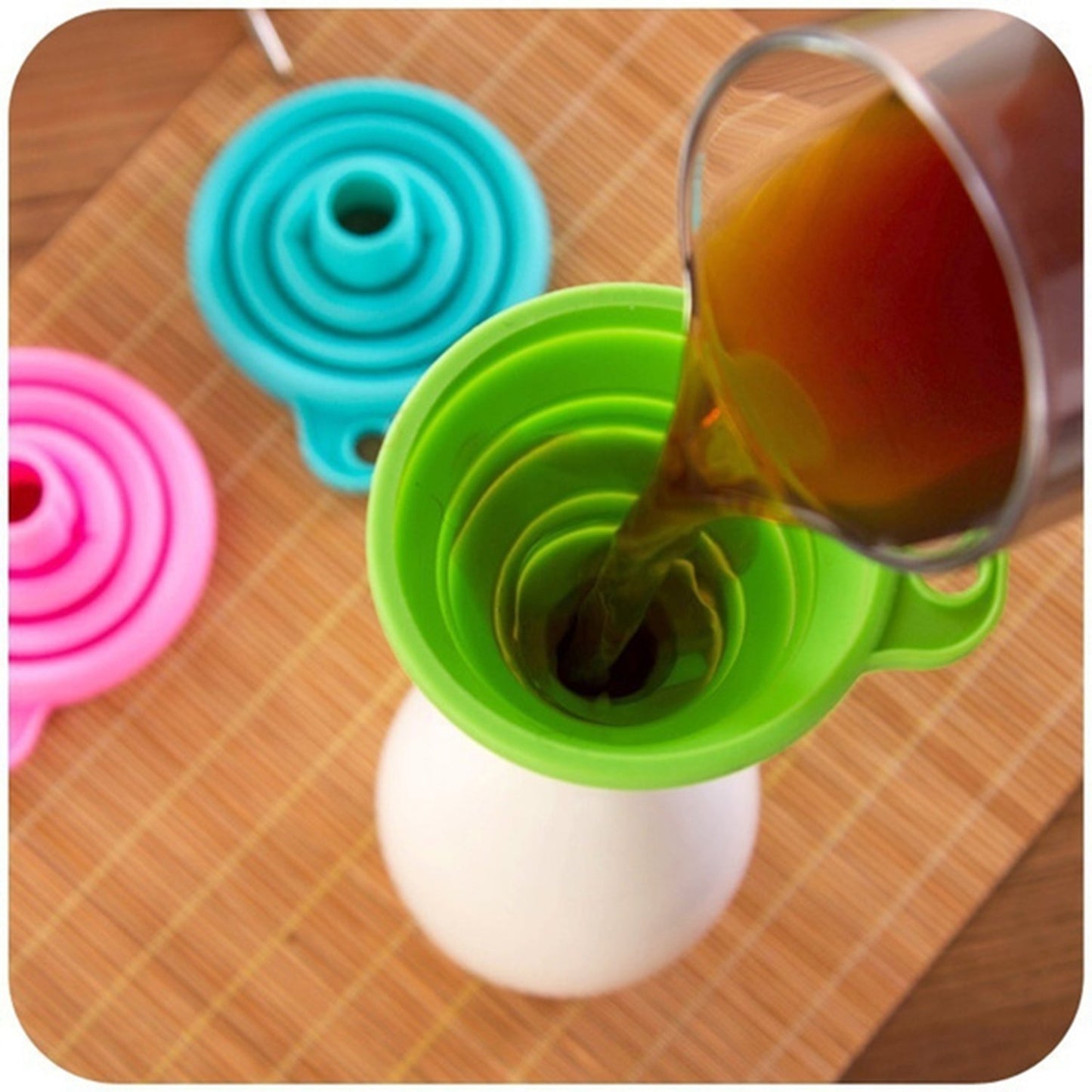 Wukusy silicone kitchen funnel for oil, sauce, water, and juice pouring, featuring a flexible, easy-to-clean design.
