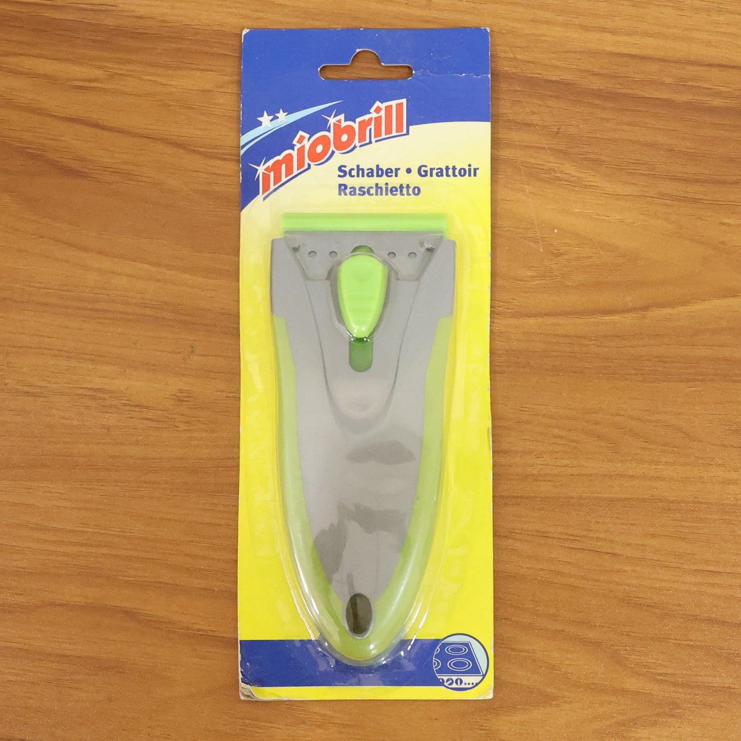 Wukusy multipurpose handheld glass surface scraper with ergonomic handle for cleaning, scraping, and removing stubborn residues.