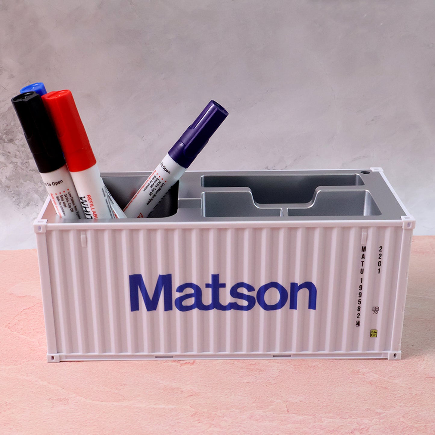 Wukusy multi-compartment desk organizer with several compartments for office supplies on a clean desk surface.