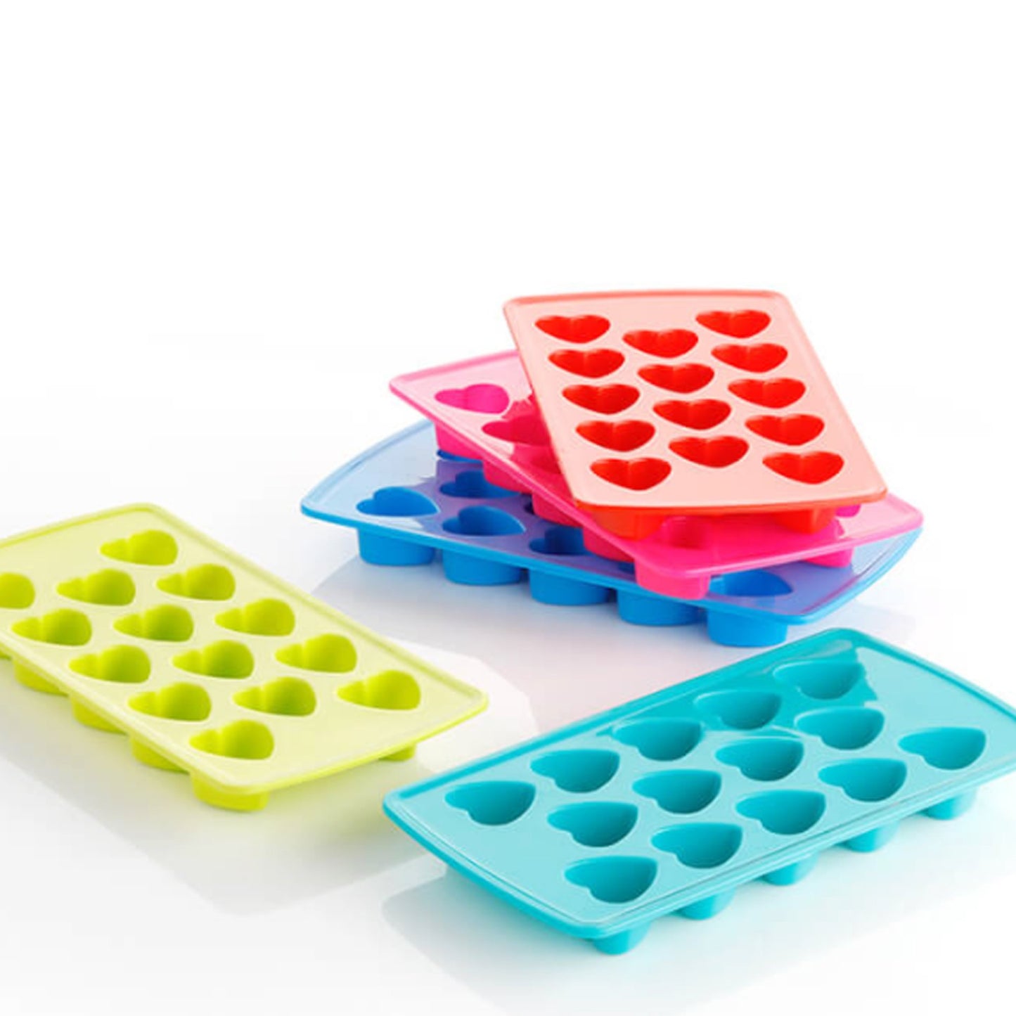 Heart-shaped ice cubes in a silicone tray from Wukusy, with the tray filled and ready to freeze.
