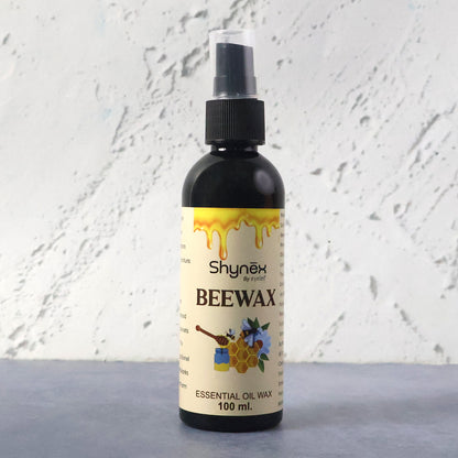 Wukusy Shynex Bee Wax Essential Oil Spray bottle with a white label and spray nozzle, ready for use.