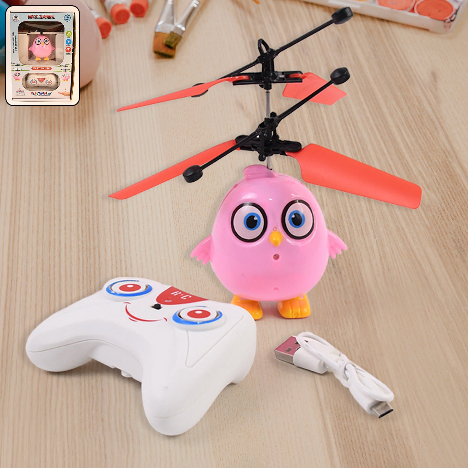 Pink owl-shaped RC toy with LED lights and remote control by Wukusy, featuring flying bird design for kids' play.