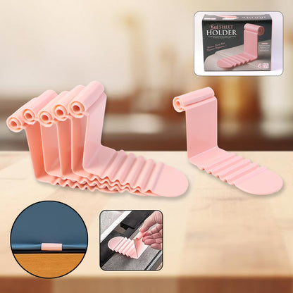 Set of six Wukusy universal bed sheet holder clips, designed to secure sheets and prevent slipping on the mattress.