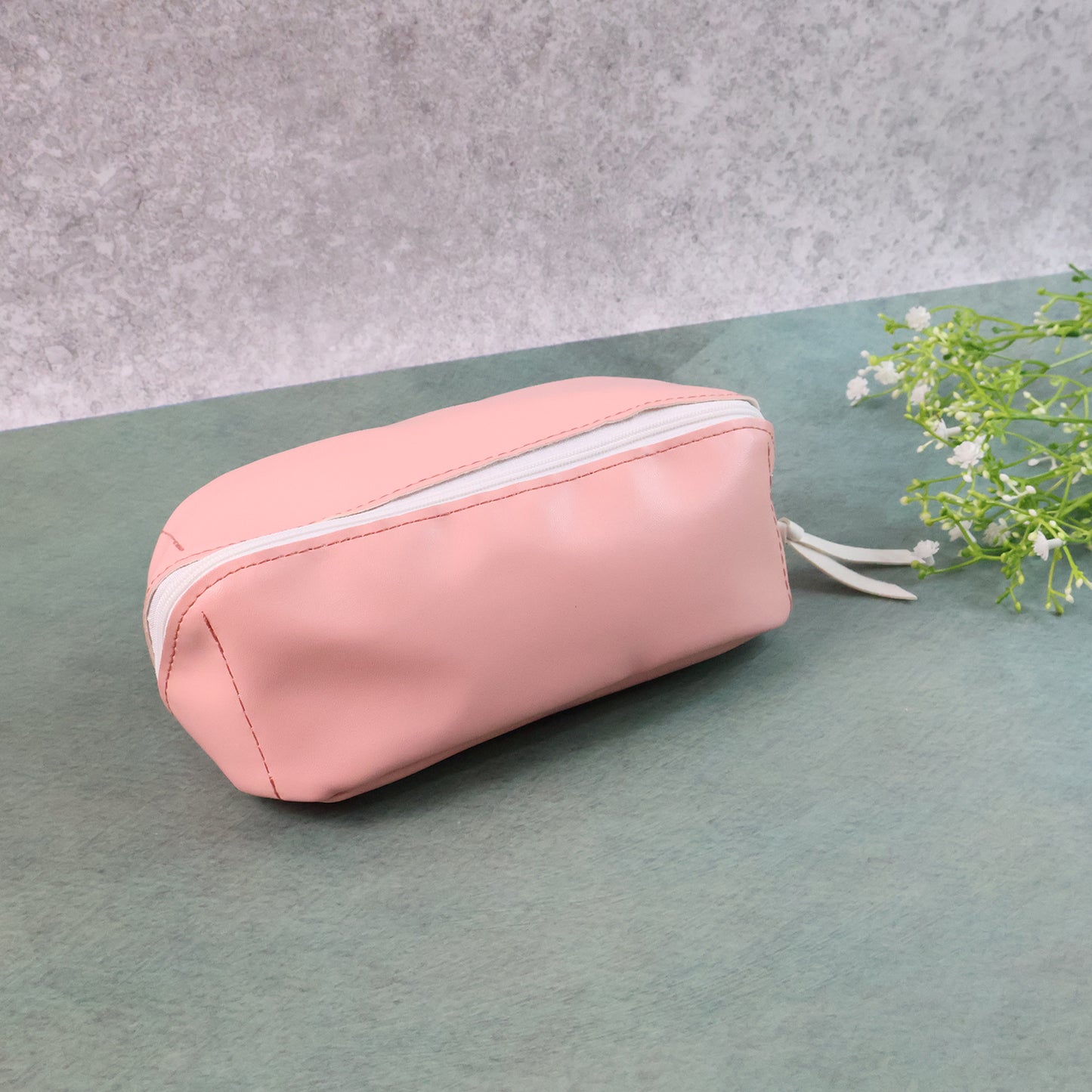 Wukusy PU leather cosmetic pencil pouch, small rectangular storage case with zipper for makeup or stationery essentials.