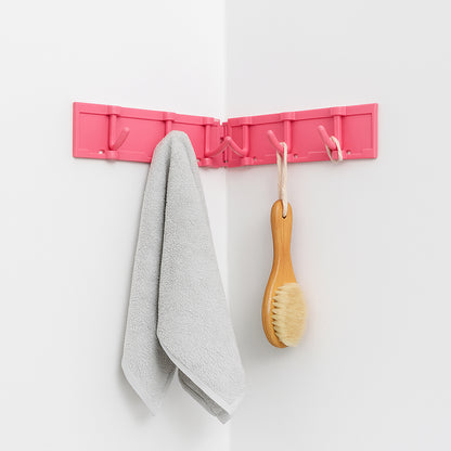 Wall-mounted foldable 6-hook rack by Wukusy, rotating and versatile for home and kitchen organization.