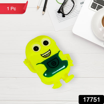 Small green Minion toy by Wukusy featuring a cute, small-sized Minion character for kids, with detailed facial expression and costume.