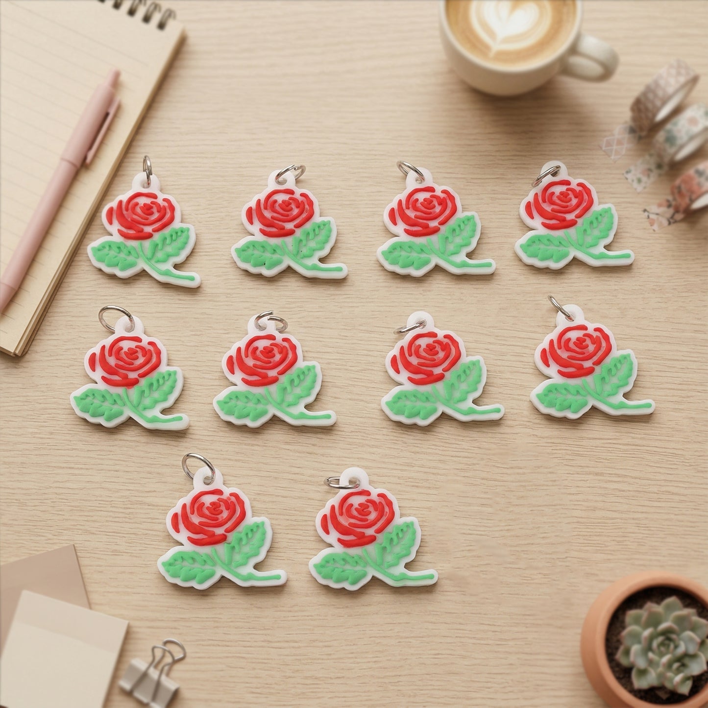 Set of 10 Wukusy rose flower design bag charm keychains with colorful, decorative floral accents for handbags or keys.