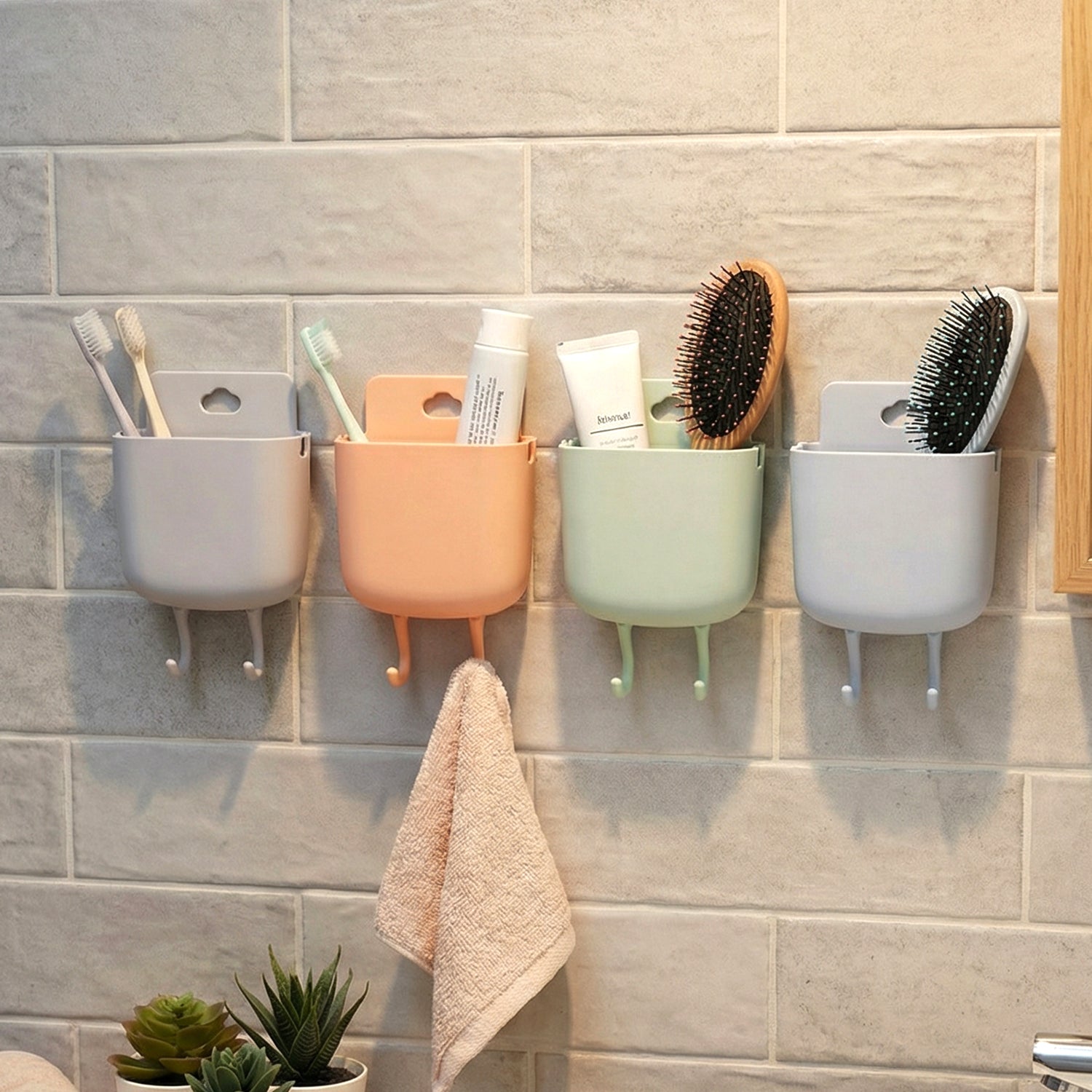 Wukusy multi-purpose plastic wall-mounted mobile charging holder set with four secure slots for smartphones and devices.