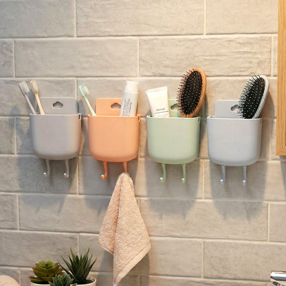 Wukusy multi-purpose plastic wall-mounted mobile charging holder set with four secure slots for smartphones and devices.