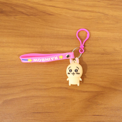 Cute Wukusy bunny character keychain hanging from a keyring, featuring adorable facial features and soft pastel colors.