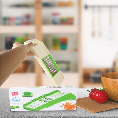 Wukusy Supermom Quick 6-in-1 Multipurpose Slicer for kitchen tasks, with various blades for slicing, dicing, and julienning.