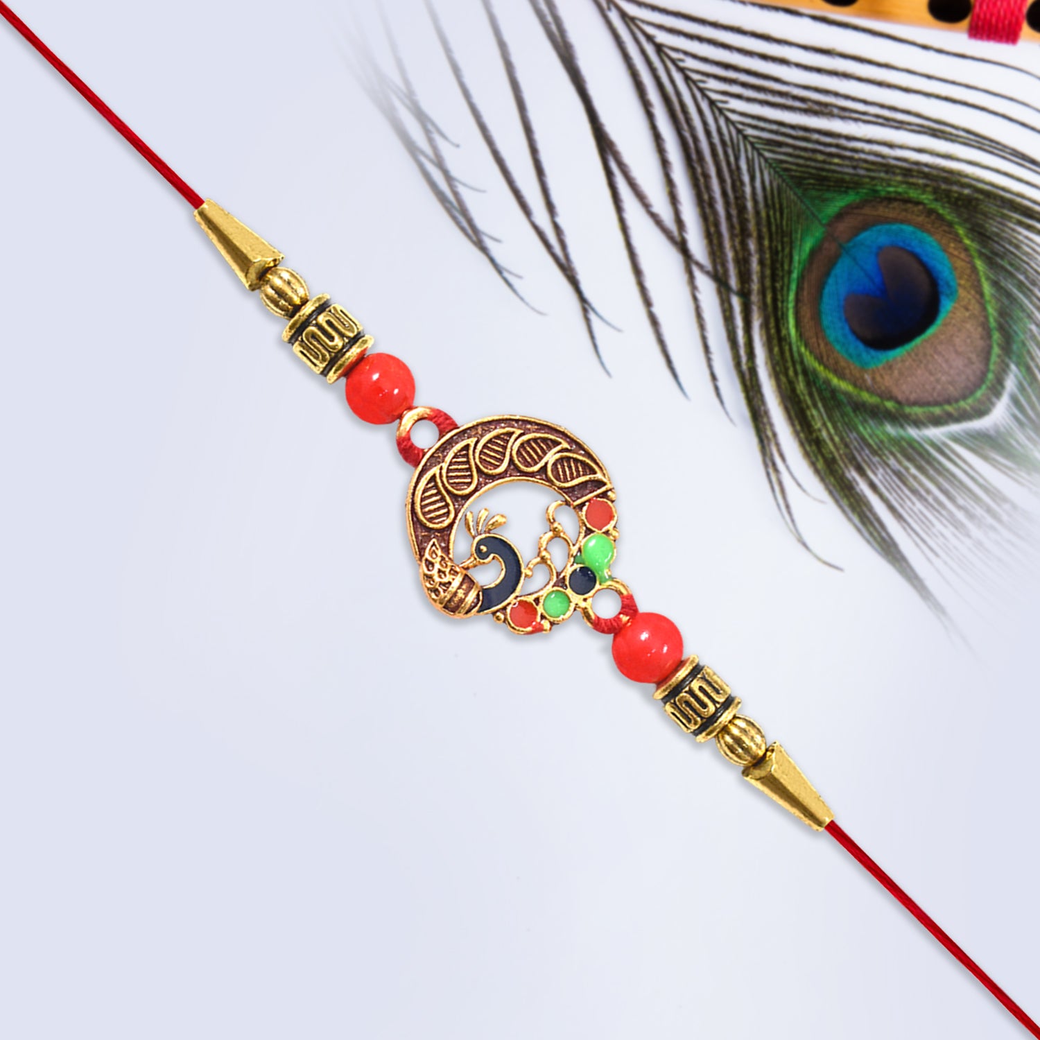 Elegant round peacock design Rakhi from Wukusy featuring intricate peacock motifs on a stylish fashion accessory.