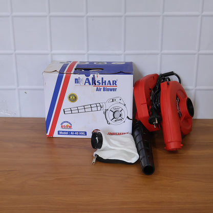 Wukusy Akshar Electric Air Blower Ai40 HNL with 650W motor, showcasing the compact design and air outlet in a close-up view.