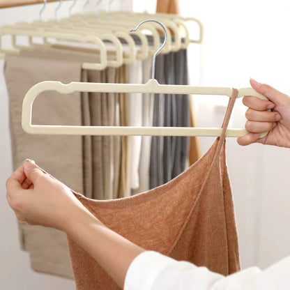 Wukusy premium velvet non-slip cloth hanger with metal hook, ideal for organizing clothes in home improvement projects.