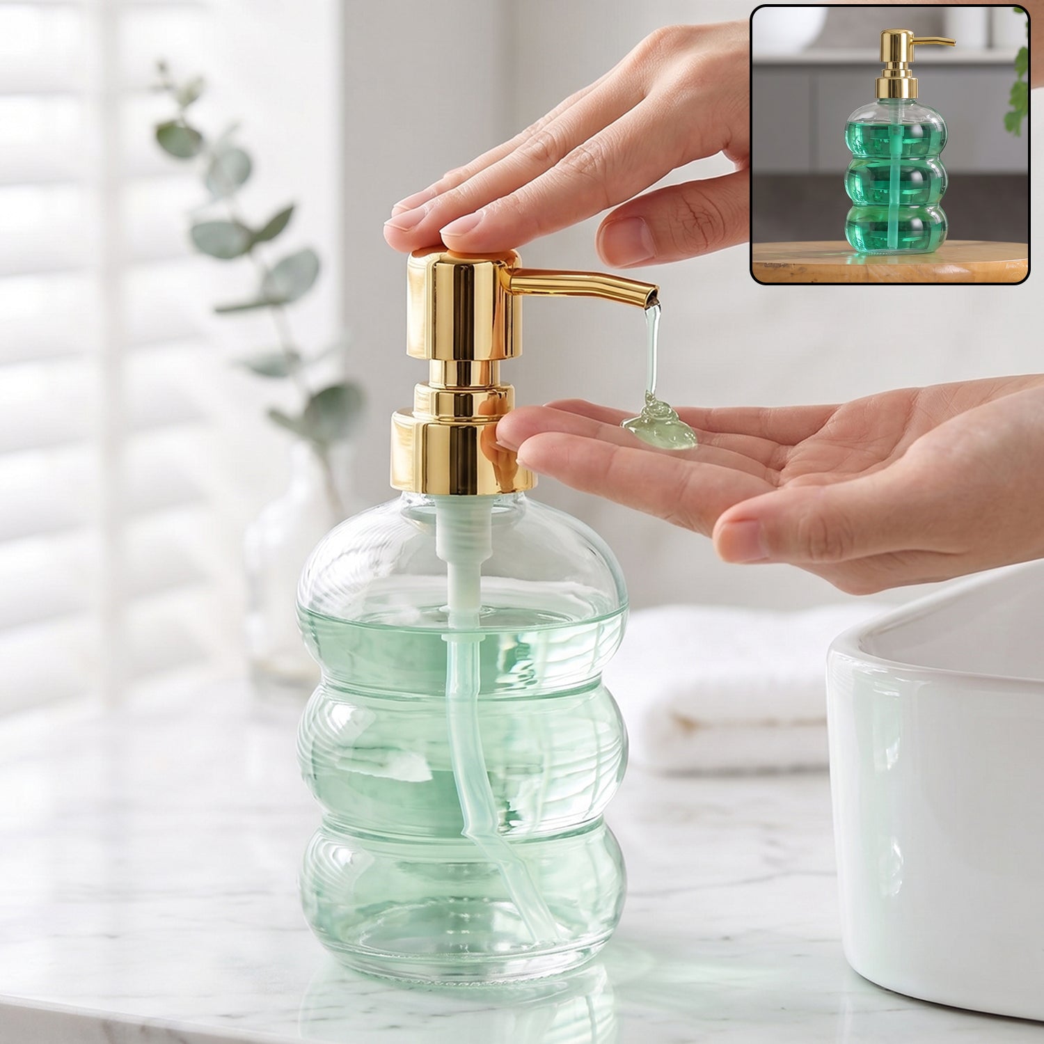 Transparent glass liquid soap dispenser with gold pump from Wukusy, showcasing a sleek and elegant bathroom accessory.