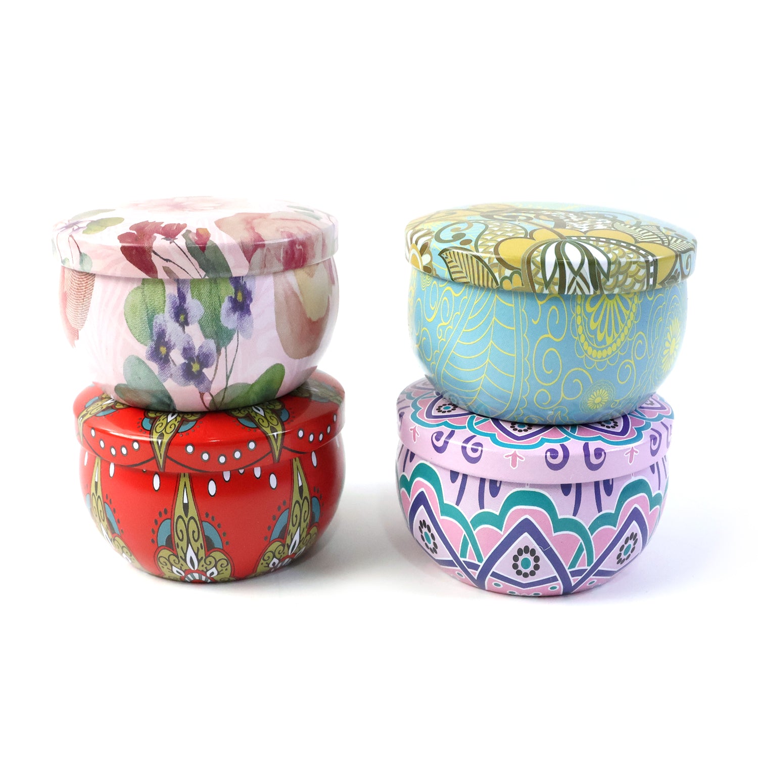 Set of four Wukusy decorative metal candle containers with intricate mandala prints, ideal for stylish home decor.