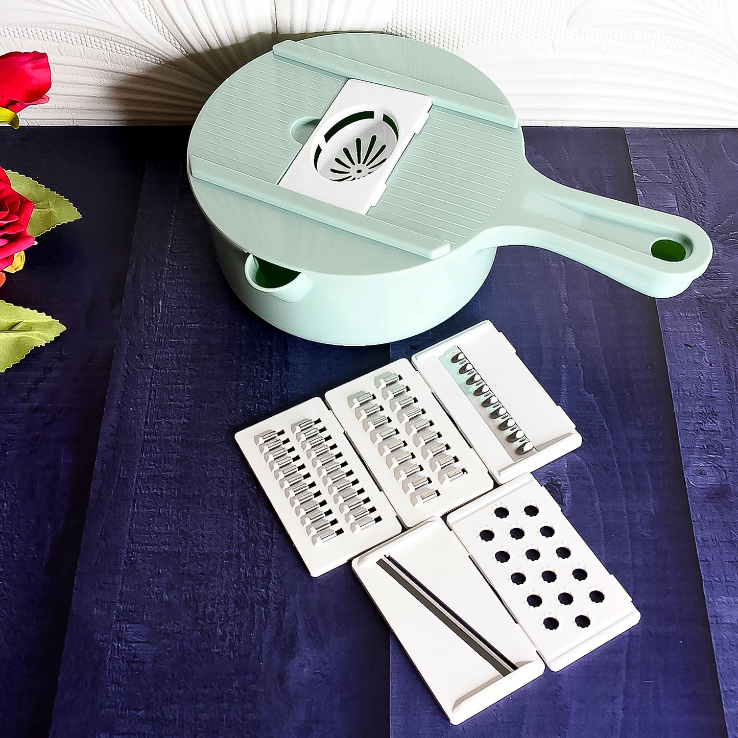 Wukusy 6-in-1 vegetable chopper with drain basket, featuring multiple slicing blades for efficient home kitchen vegetable prep.