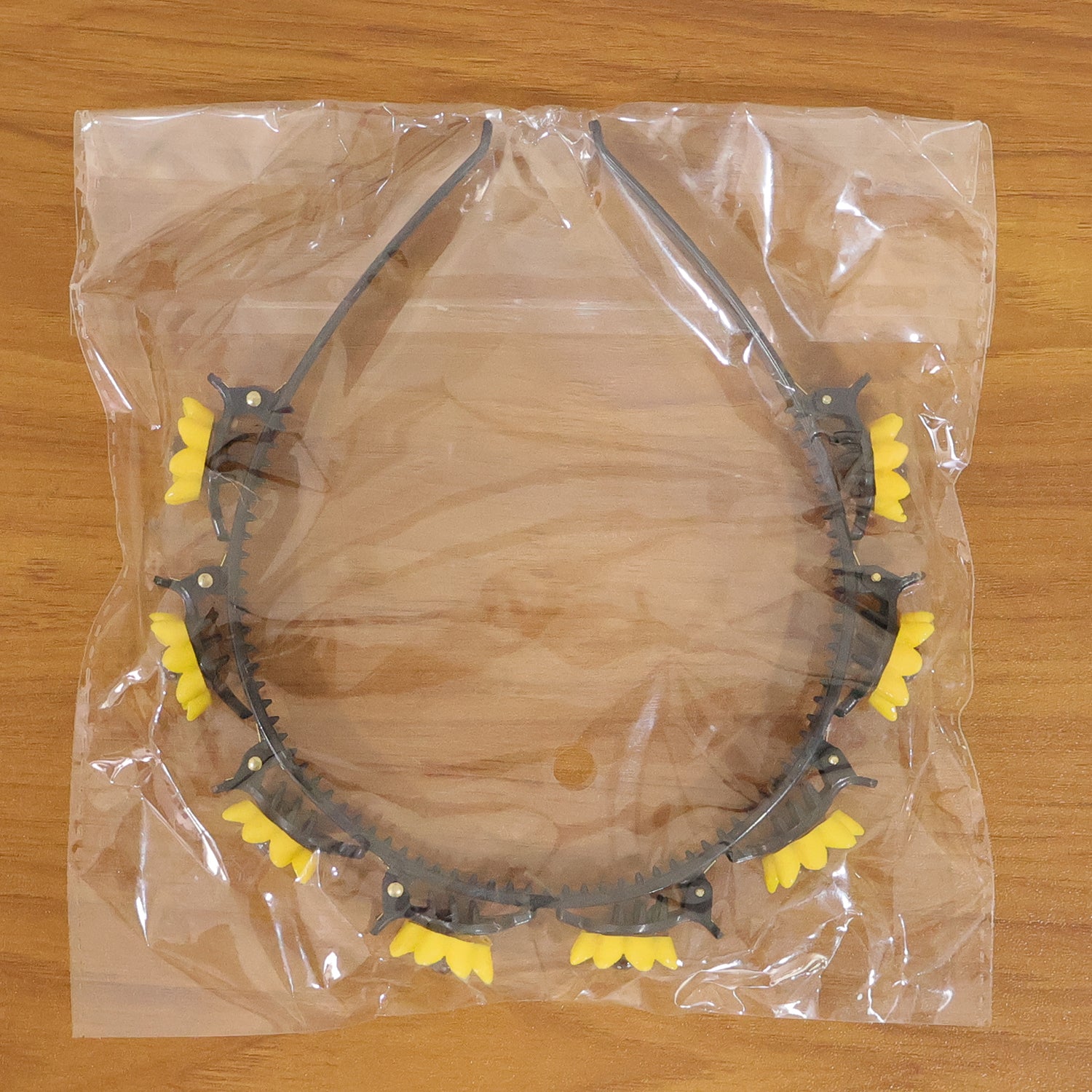 Wukusy sunflower floral clip hair band with yellow sunflower design, decorative hair accessory on a white background