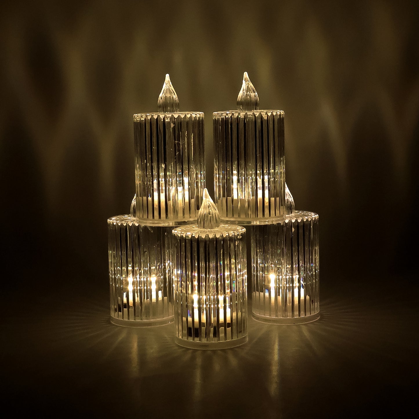 Set of five Wukusy crystal effect LED flameless candle lights for home decor, with warm glow and realistic flickering appearance.