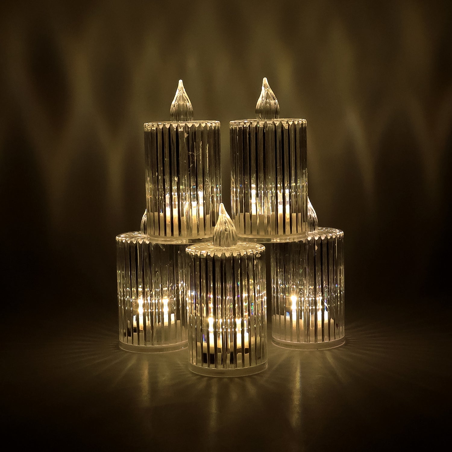 Set of five Wukusy crystal effect LED flameless candle lights for home decor, with warm glow and realistic flickering appearance.